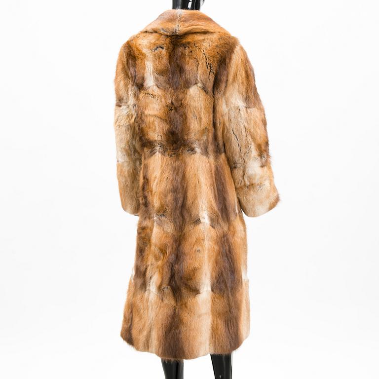 A MUSKRAT FUR COAT.