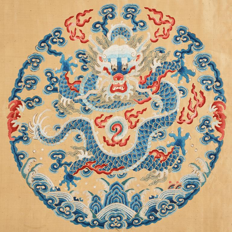 A group of Chinese silk embroideries, Qing dynasty, circa 1900.