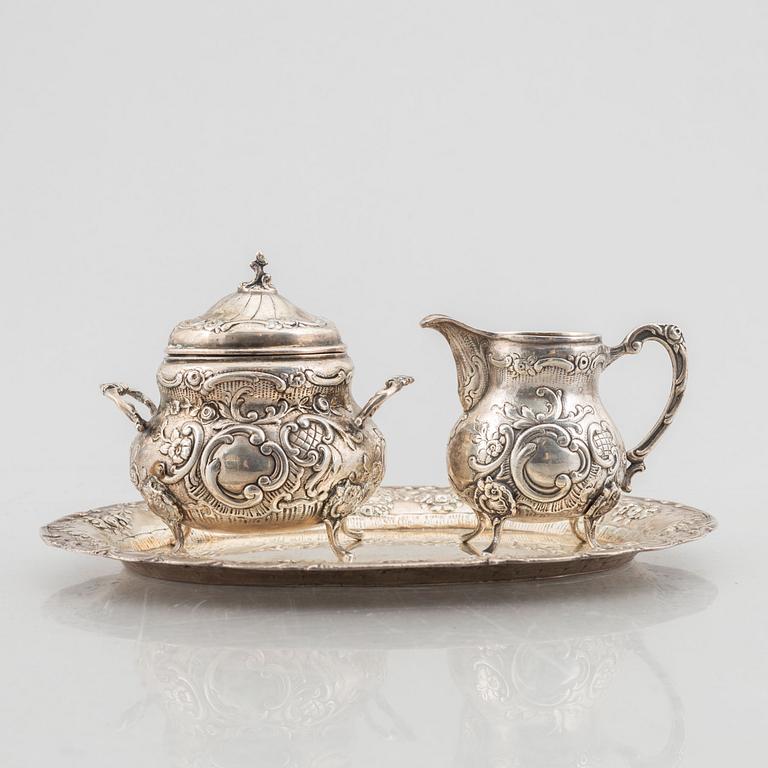 A Swedish silver sugarbowl, creamer and tray, mark of JL Hultman AB, Stockholm 1951-1952.