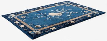 An antique rug, probably Beijing, northern China, around 1910, c. 235x150 cm.