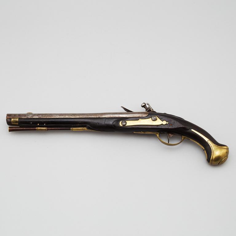 A 18th century flintlock pistol.