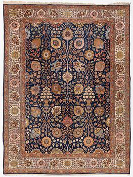 A semi-antique Tabriz carpet, c. 395 x 295 cm.