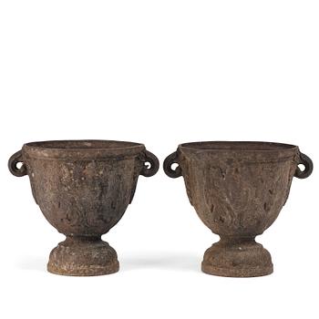 243. A pair of Swedish baroque cast-iron urns, circa 1700.