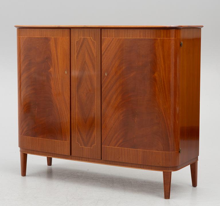 A mid20th century cabinet, Sweden.