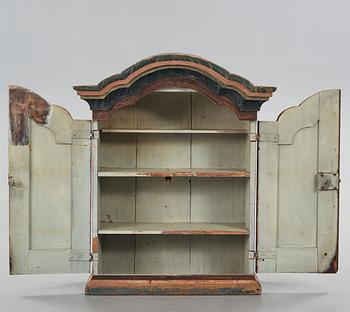 a 18th century folklore wall cabinet from Hälsingland.