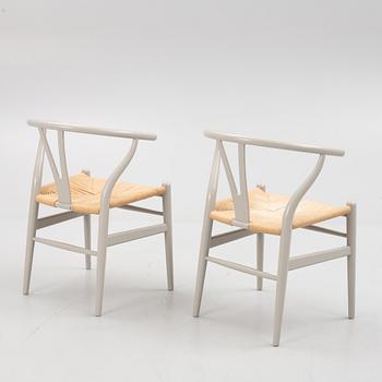 Hans J. Wegner, a pair of model 'CH-24' chairs, Carl Hansen & Søn, Denmark.