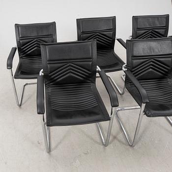 A set of five chrome and leather armchairs alter part of the 20th century.