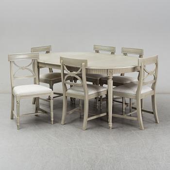 A dining table and six chairs, Gustavian style, second half of the 20th century. One leaf included.
