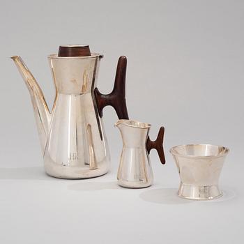 TAPIO WIRKKALA, A COFFEE POT, SUGAR BOWL AND CREAMER. Signed TW. Kultakeskus, Hämeenlinna 1962/-64.