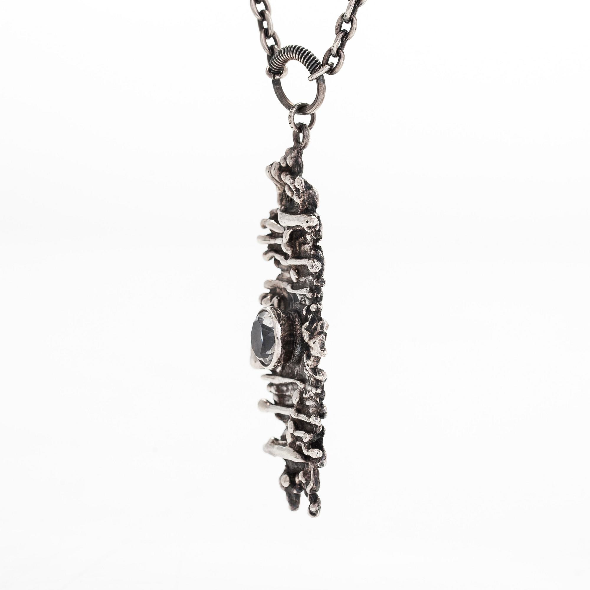 Pentti Sarpaneva, a silver and rock crystal necklace, ring and earrings, Turun Hopea, Turku.