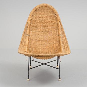 A 'Stora Kraal' rattan easy chair from Nordiska Kompaniet, 1950's.