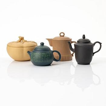 A group of three yixing teapots and a box with cover, China, 1970/80s.