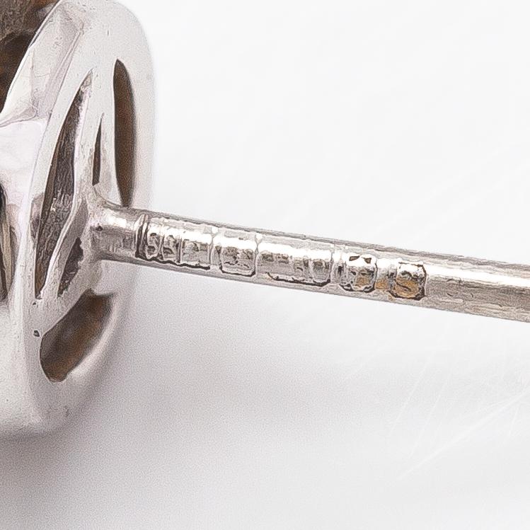 Cassandra Goad, a pair of 18K white gold earrigns with diamonds ca. 0.54 ct in total.