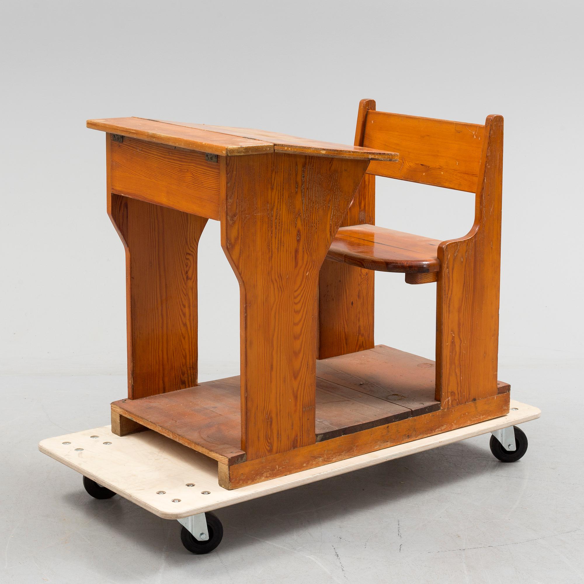 A first half of the 20th century school bench.