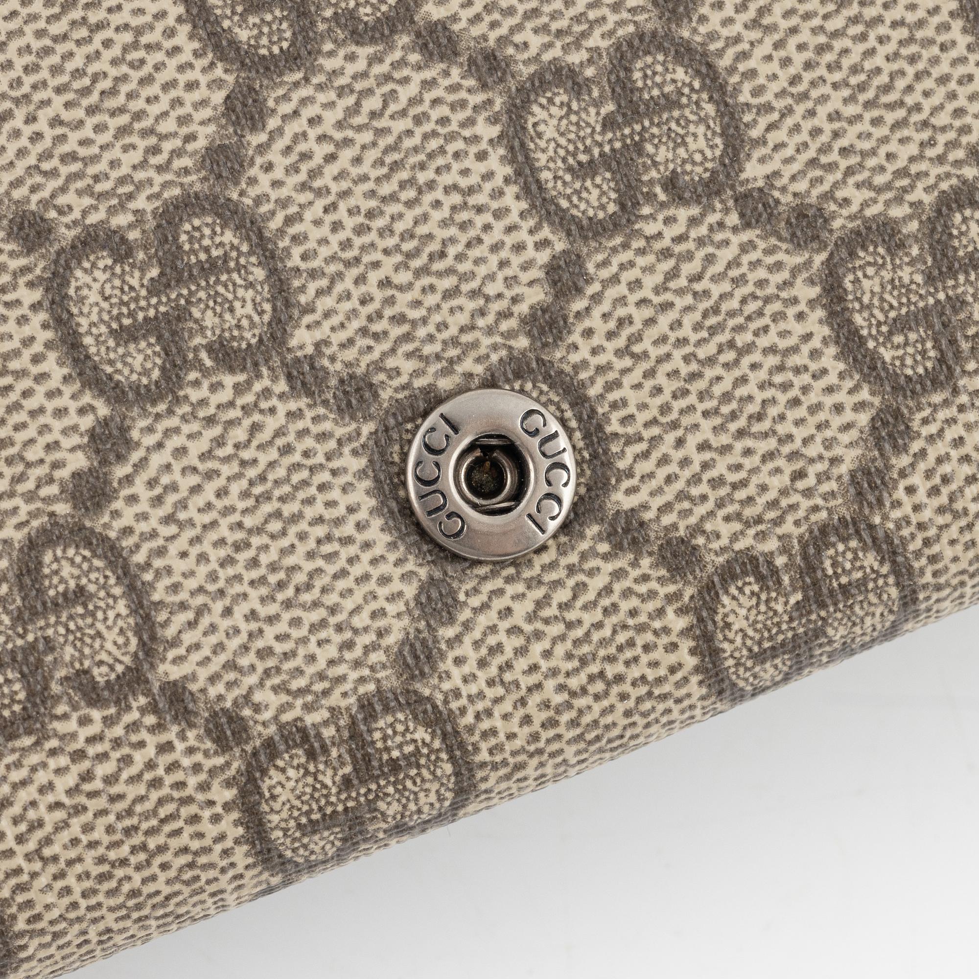 Gucci, "Dionysus chain wallet".