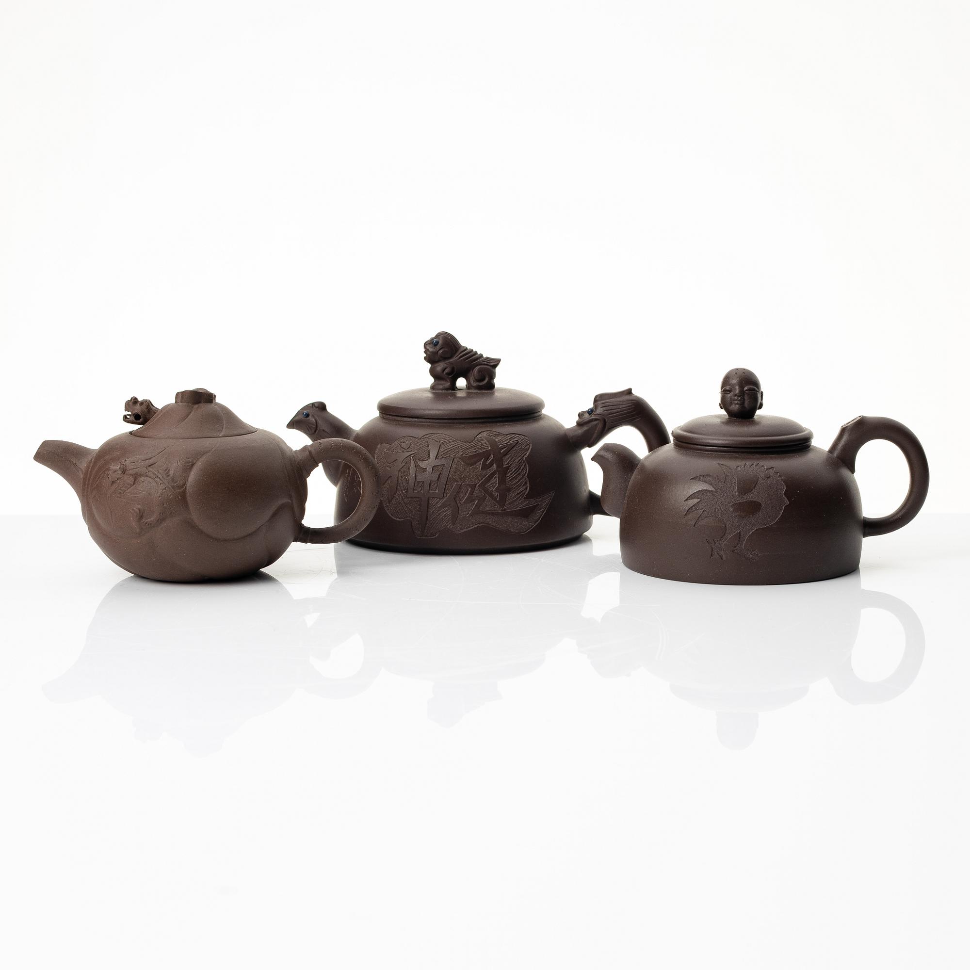 A group of three Chinese yixing teapots, 1980s.