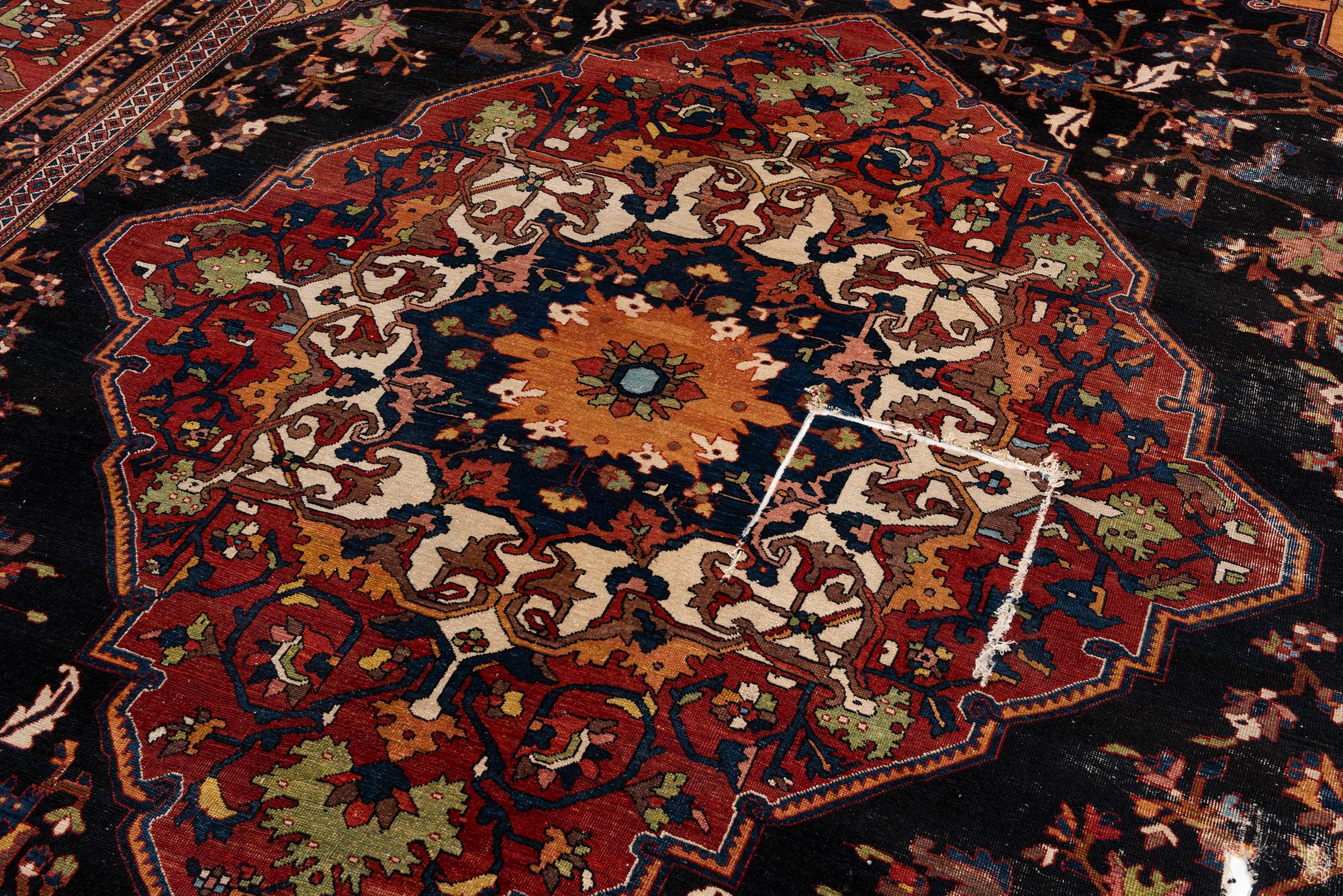An antique 'khan carpet', Bakhtiari, western persia. c. 550 x 350 cm.