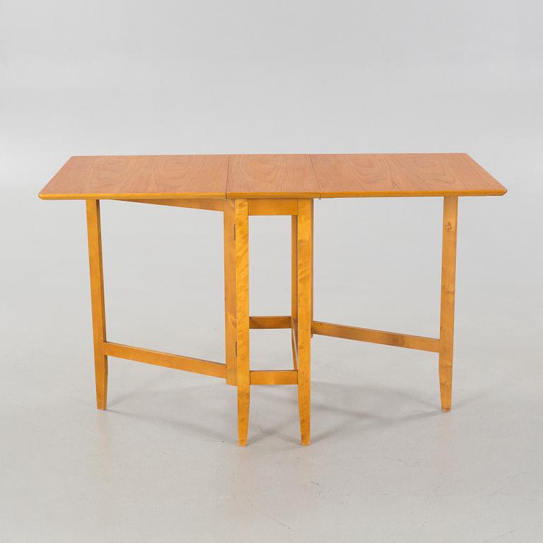 A gate-legged table by Edsbyverken in 1959.