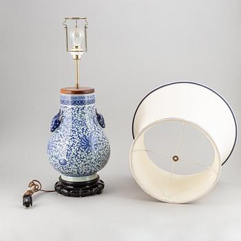 A pair of Chinese blue and white vases, turned into table lamps, modern.