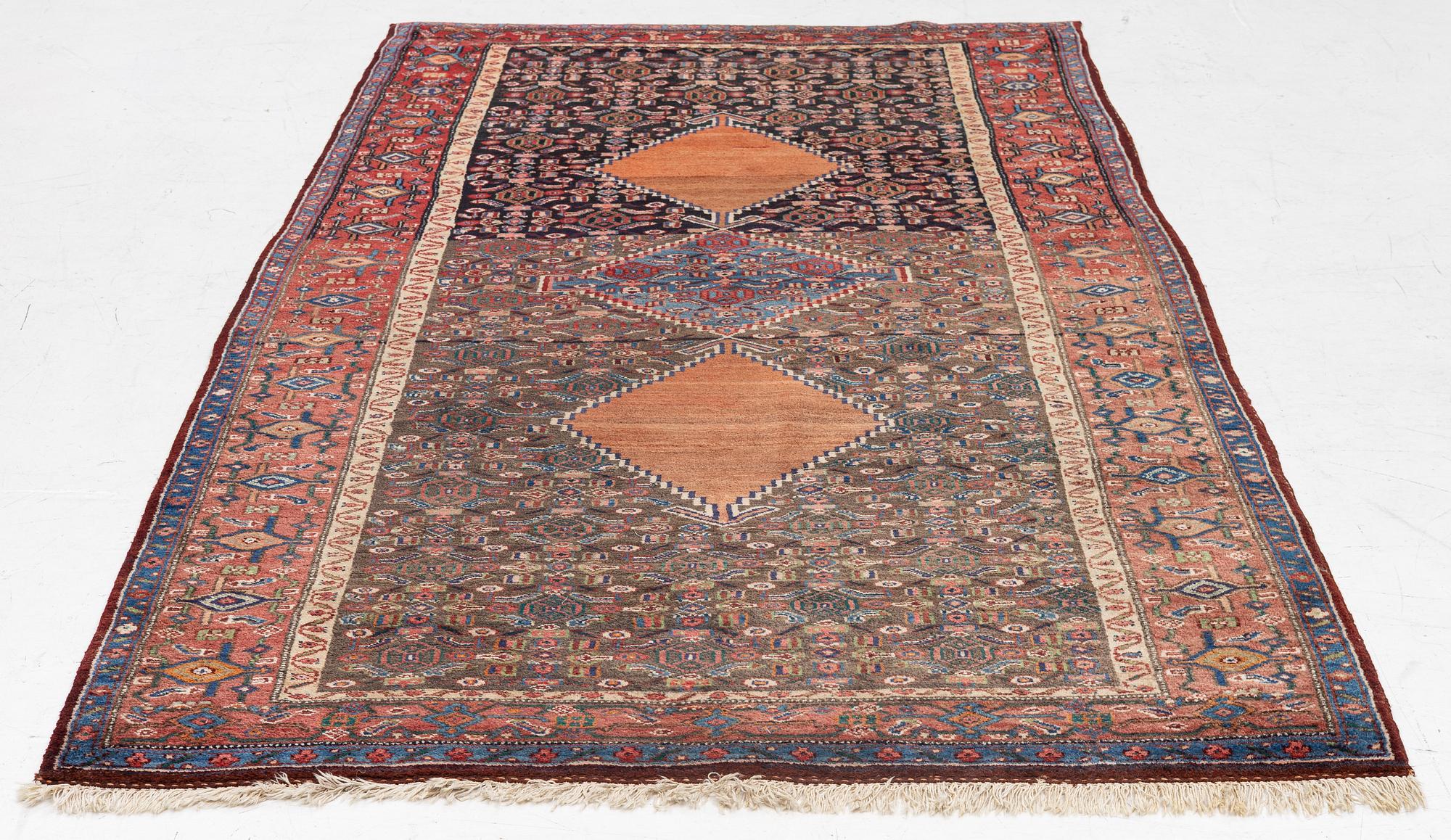 A semi-antique Bidjar rug, c. 255 x 135 cm.