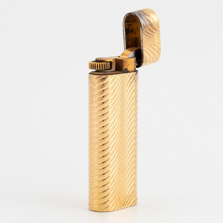 Cartier lighter ,with case 18K gold, Elon Arenhill.