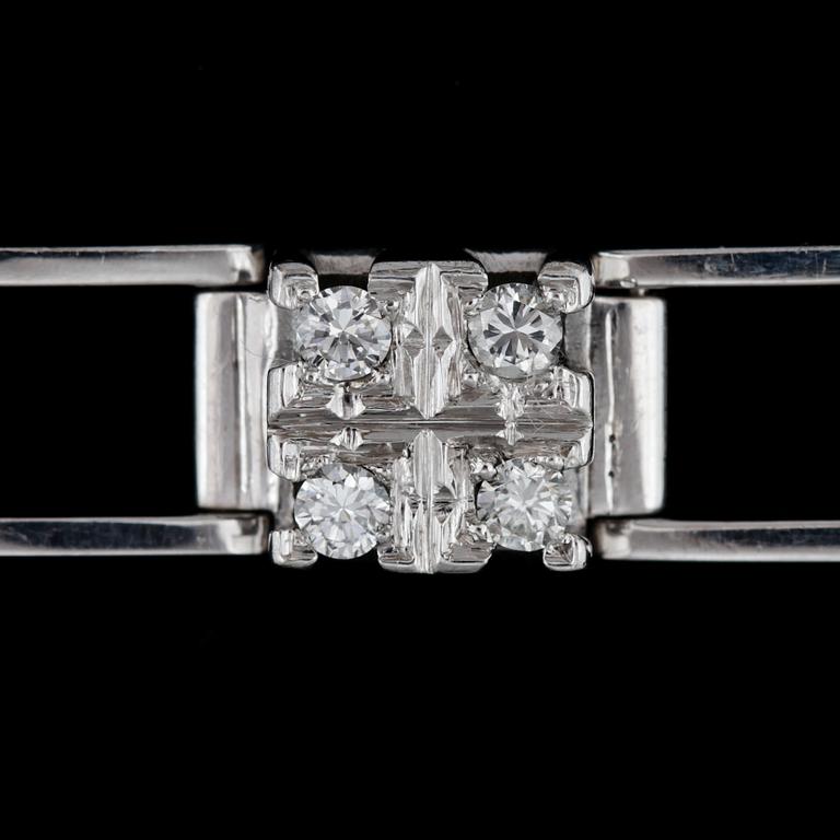 A blue sapphire and brilliant cut diamond bracelet, tot. app 0.70 cts.