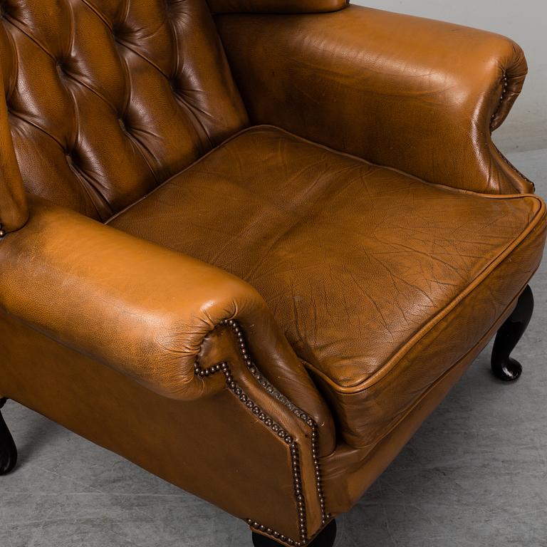 A pair of second half of the 20th century chesterfield model easy chairs.