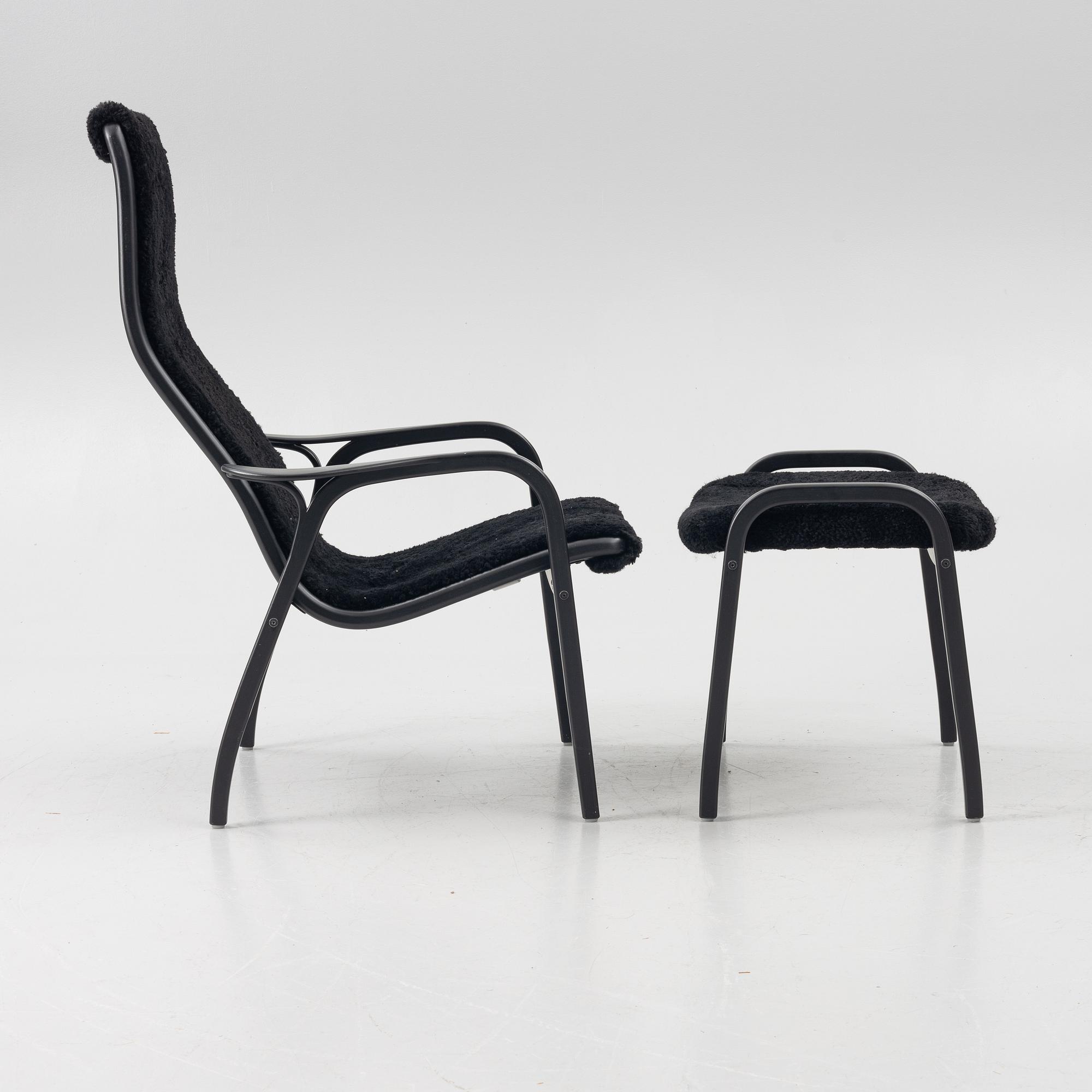 Yngve Ekström, a 'Lamino' easy chair with footstool, Swedese, 2018.