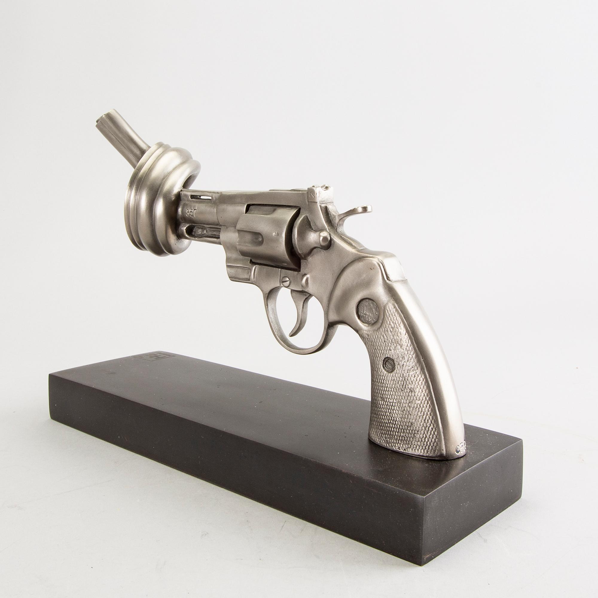 Carl-Fredrik Reuterswärd/ The Non-Violence Project Foundation, a signed and numbered sculpture 55/150 in humanium metal.