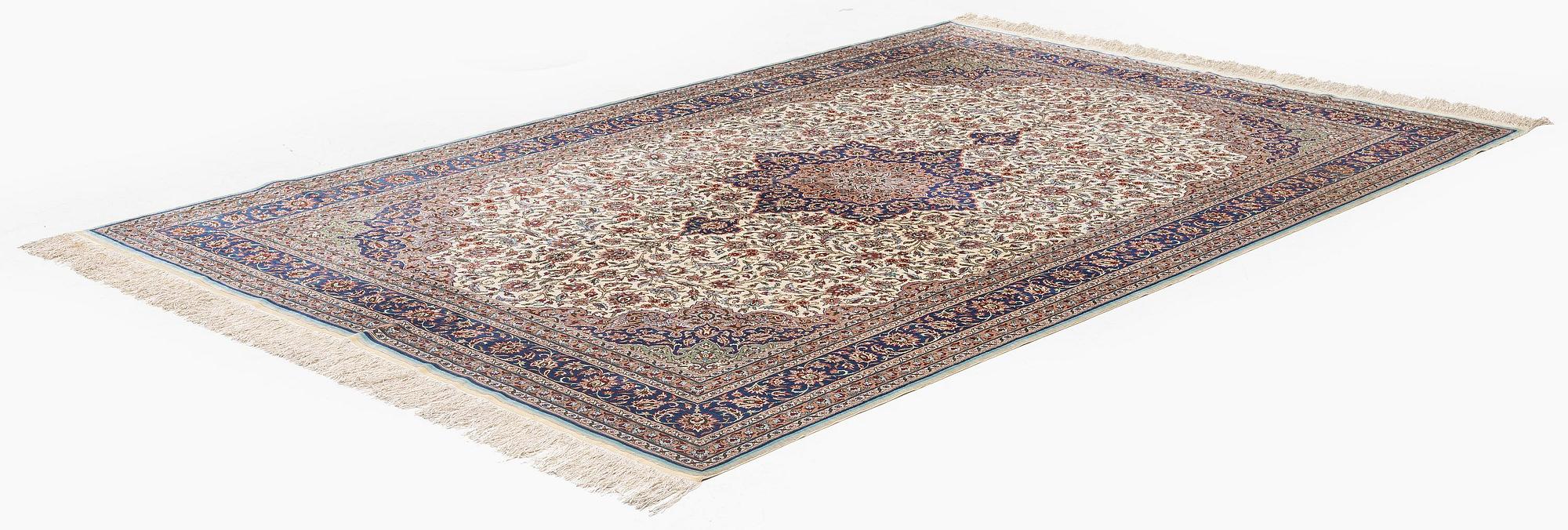 A silk Kayseri/Hereke carpet, c. 310 x 195 cm.
