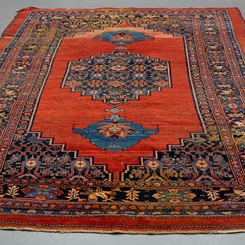 AN ANTIQUE BIDJAR CARPET, CA 374 X 224 CM.