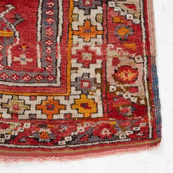 A semi-antique Anatolian rug, possibly Konya, approximately 152 x 117 cm.