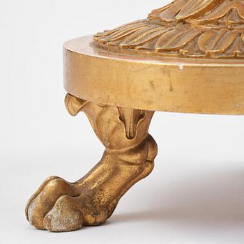 A pair of late Gustavian giltwood torchères by J. Frisk (master in Stockholm 1805-24).