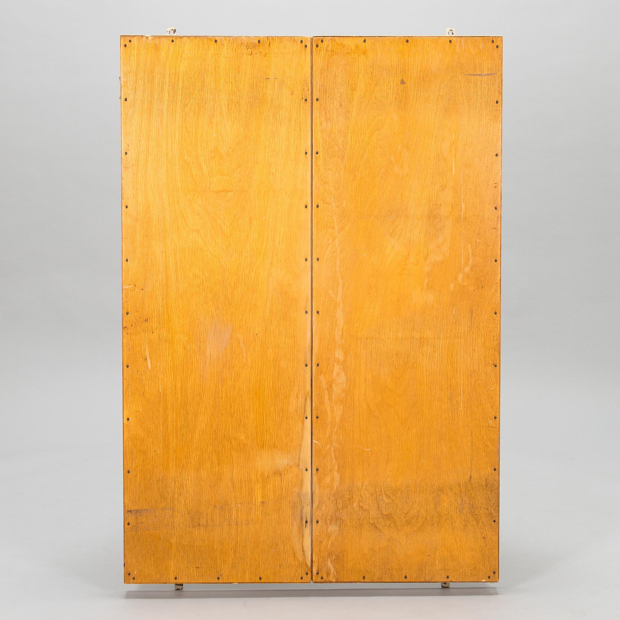 A 1950s three-part dressing mirror.