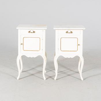 A pair of painted Rococo style bedside tables mid 1900s.
