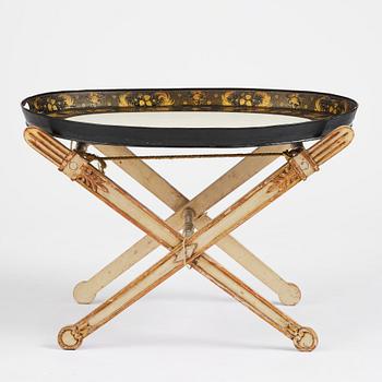A tole-peinte Empire tray, first part 19th century on a later stand.