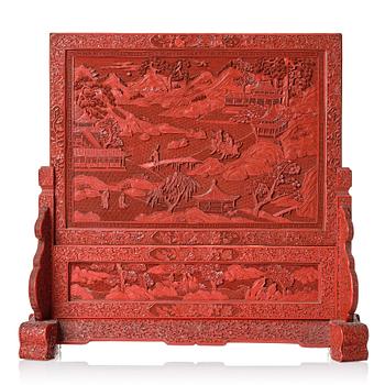 859. A red lacquer screen, Qing dynasty, 19th Century.