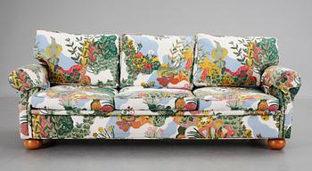 696. An Arne Norell sofa upholstered in Josef Frank's fabric 'Anakreon'.