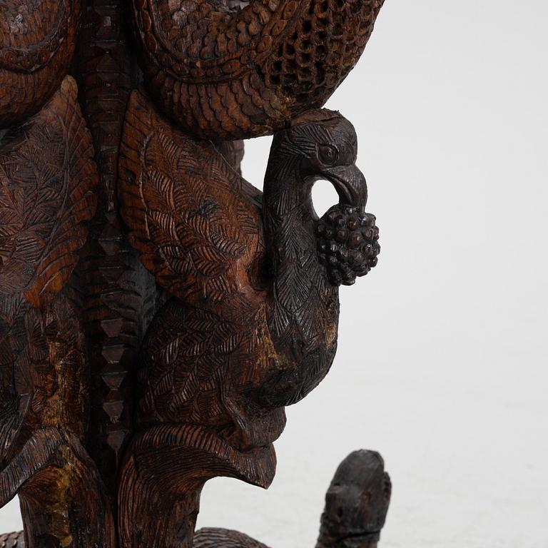 A South East Asian carved wooden piedestal,  20th Century.