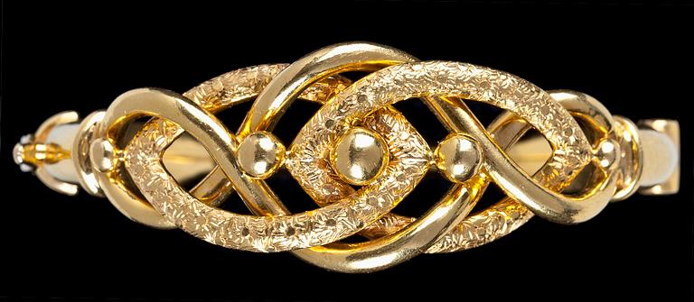 A handmade gold bangle/bracelet.