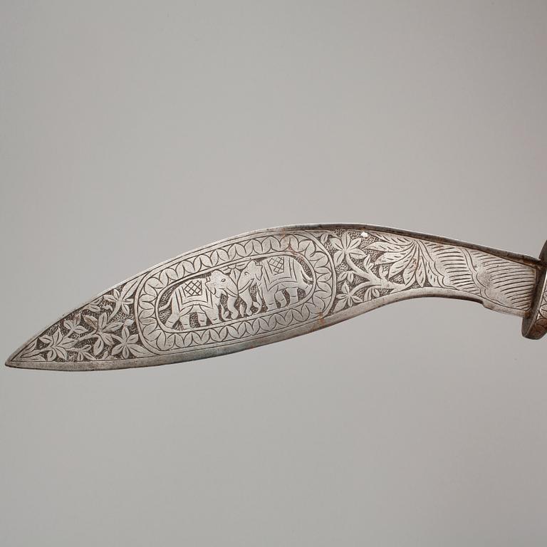 KUKRI samt YXA, indopersiska, stål, 1900-talets första hälft.
