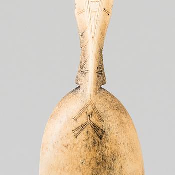 A set of 3 Sami objects, a knife by Anders Niia, 1929, a spoon and a Spear tip, beginning of  20th century.