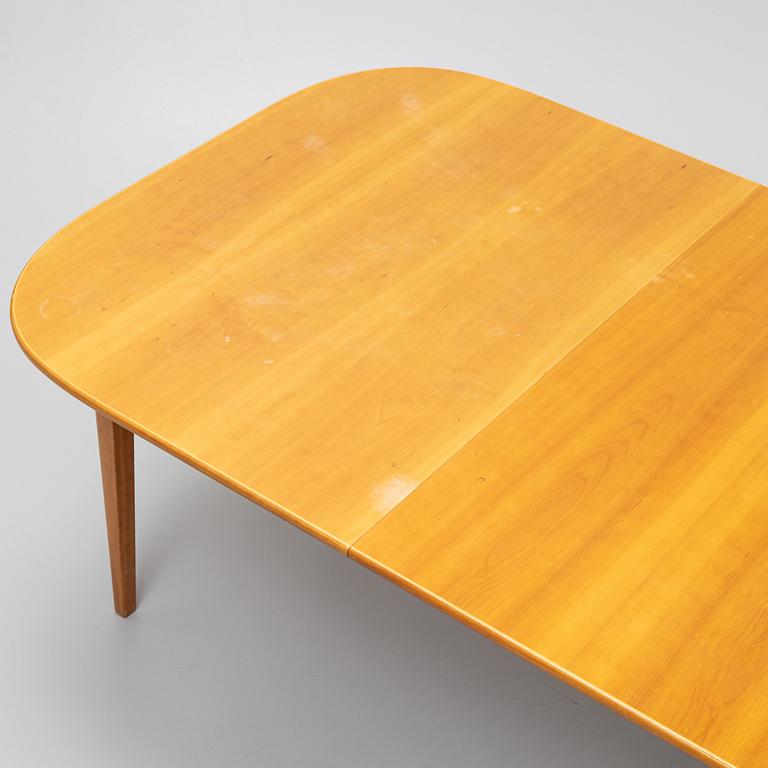 Josef Frank, an elmwood-veneered model 947 dining table, Firma Svenskt Tenn, Sweden.