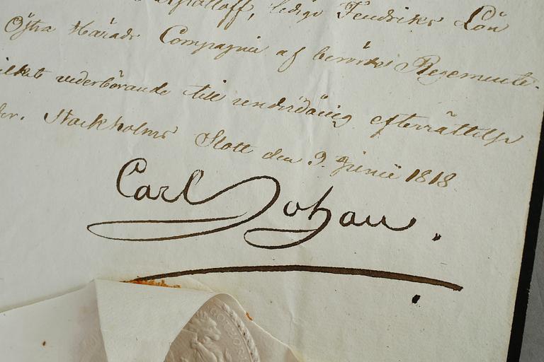 KARL XIV JOHAN AV SVERIGE OCH NORGE, dokument med kunglig autograf, egenhändigt signerat samt med sigill, daterat 1818.