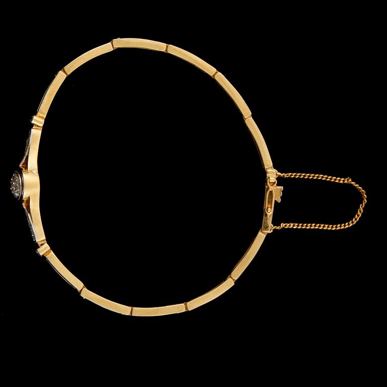 ARMBAND, 18k vit- och rödguld med gammal- och rosenslipade diamanter. Vikt ca10g.
