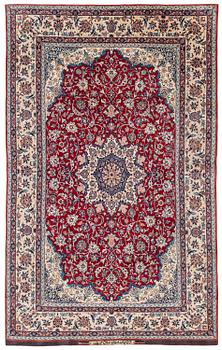 494. A semi-antique Isfahan rug, Central Persia, signed (Sadegh) Seirafian, c. 237 x 146 cm.