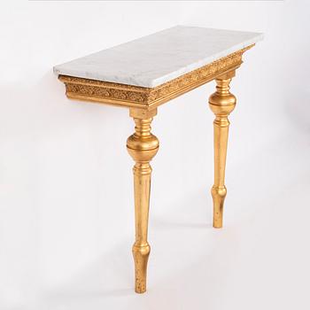 A mirror and a console table, around the year 1900.