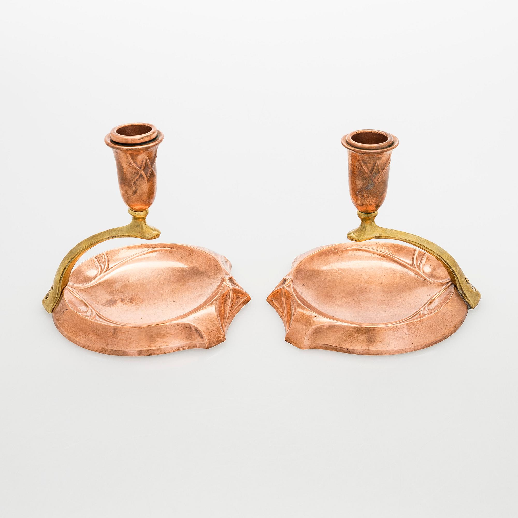 A pair of early 20th century WMF (Württembergische Metallwarenfabrik), candlesticks.