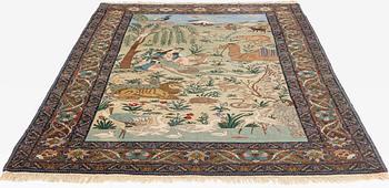 A carpet, semi-antique, Tabriz, signed, ca 271 x 175 cm.