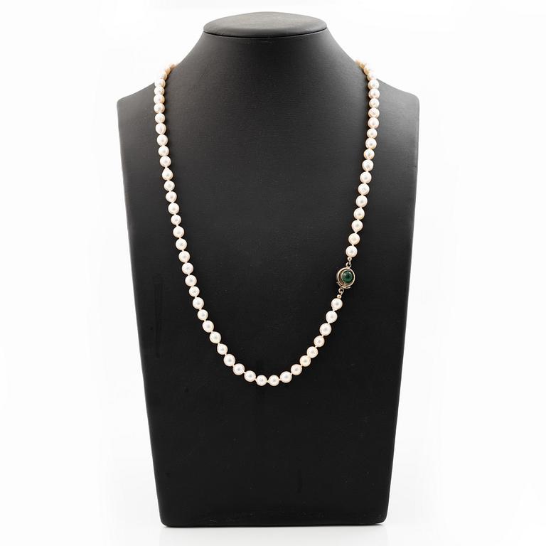 Cultured pearl necklace with Niels Erik From clasp, Denmark, silver set with a green cabochon-cut stone.